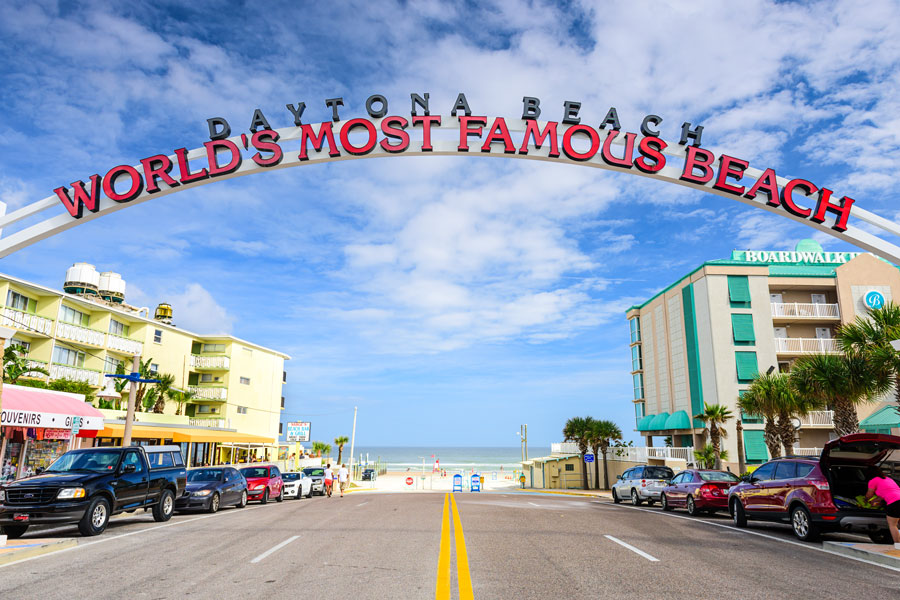 Daytona Beach sign. The popular spring break destination is dubbed "World's Most Famous Beach." Daytona Beach, Florida - January 3, 2015. Editorial credit: Sean Pavone / Shutterstock.com, licensed.