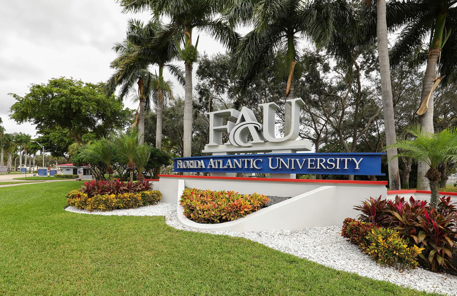 Entrance sign to Florida Atlantic University (FAU) a public university with 5 satellite campuses in the state of Florida, as seen on December 10, 2019. Editorial credit: Jillian Cain Photography / Shutterstock.com, licensed.