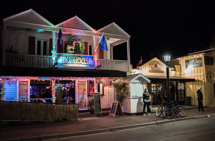 A Duval Street scene at night in the Key West part of Florida. Duval Street is a popular part of Key West for tourists. Key West, Florida. 