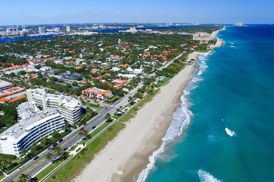 Aerial view of Palm Beach Island, just East of West Palm Beach, Florida. The beaches are some of the most beautiful in Florida and normally have waters in the range of 80 degrees. These are the beaches most West Palm Beach residents and visitors use.