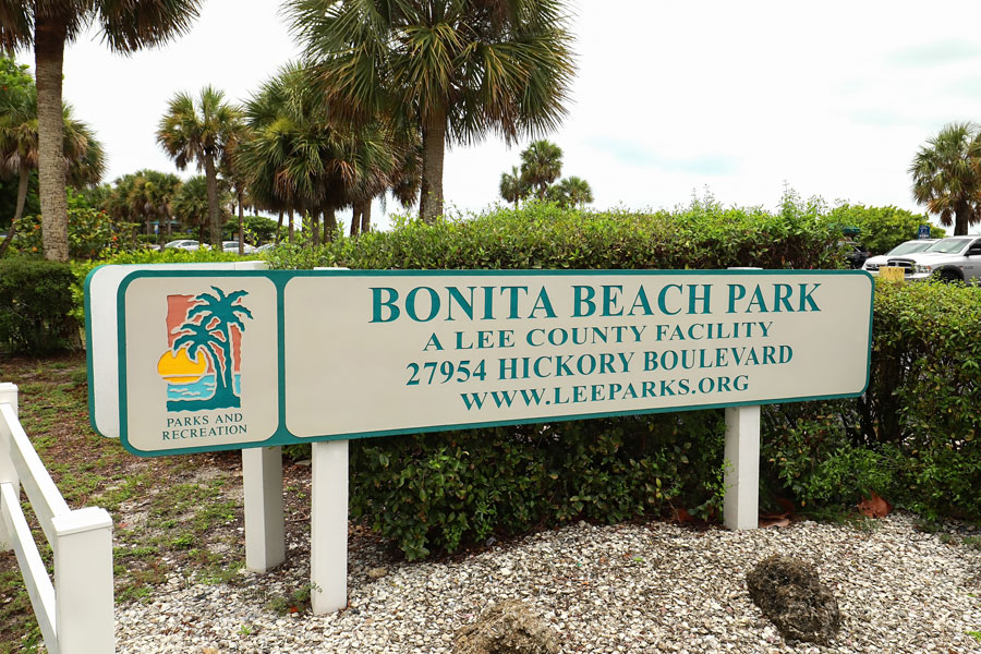 Bonita Beach Park sign, the public park is located between Fort Myers Beach and Bonita Springs, a 2.5 acre beachfront park as seen on July 21, 2020. Editorial credit: Jillian Cain Photography / Shutterstock.com, licensed.