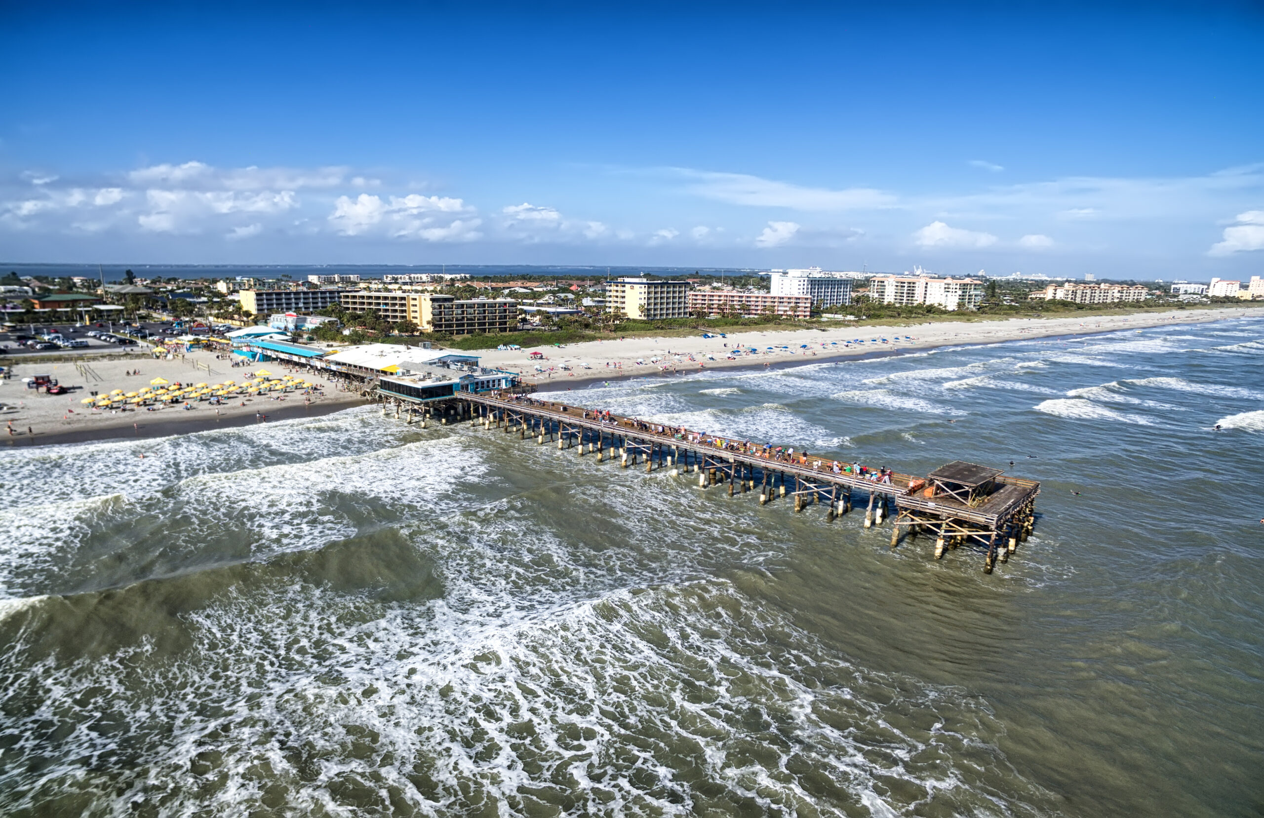 Daytime Cocoa Beach Pier aerial view, Cape Canaveral, Florida. Photo credit ShutterStock.com, licensed.