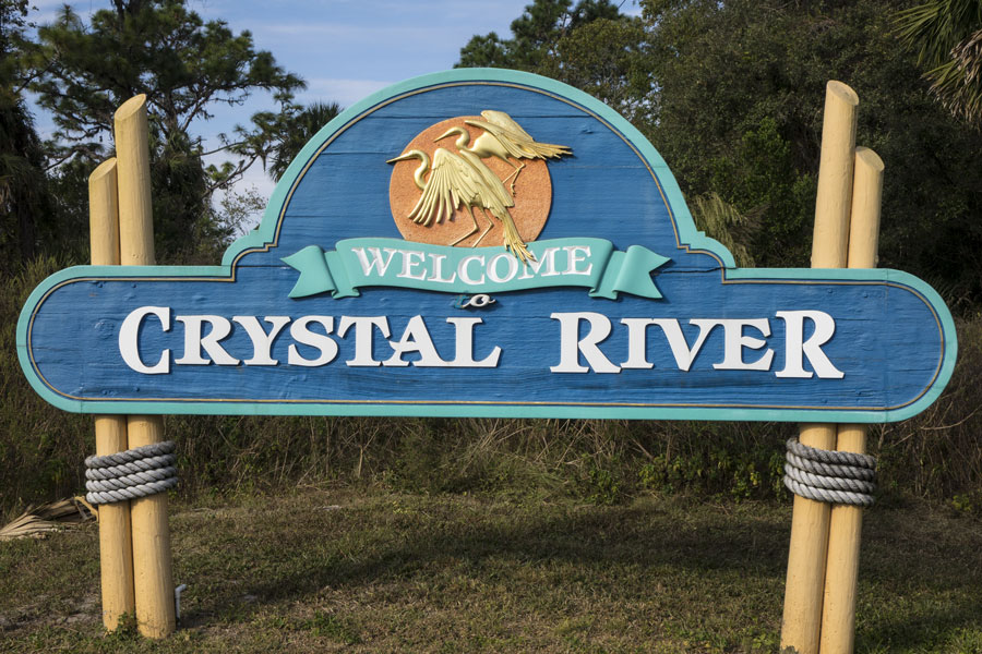 Welcome sign, Crystal River. The area is famous for the Winter migration of endangered Florida manatees. Crystal River, Florida on November 08, 2016. Photo credit: JSvideos / Shutterstock.com, licensed.