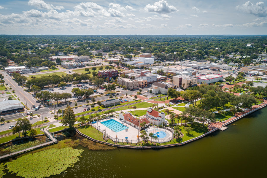 An aerial view Eustis, FL over Lake Eustis facing Ferran Park. 