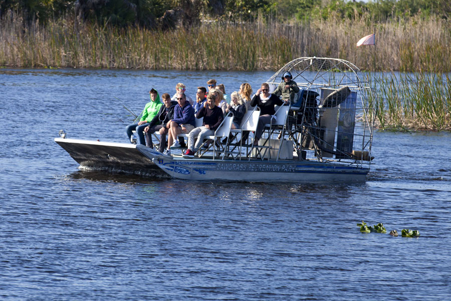 Tourists enjoying an airboat ecotour of the Sawgrass Recreation Park in the National Everglades Park near Weston, Florida on February 13, 2016. 