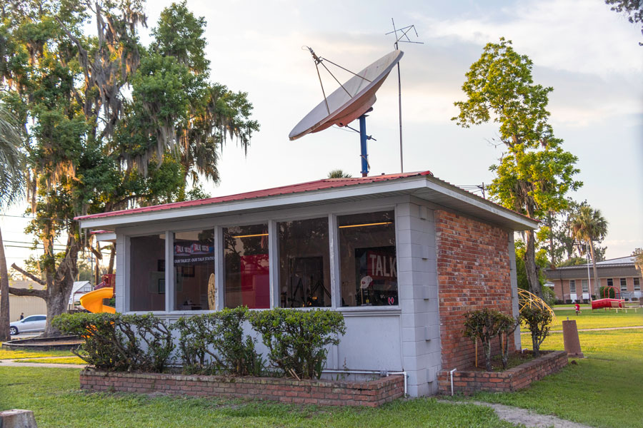 A talk radio station occupies a tiny building on the edge of a public park in the center of town along U.S. Route 41. Jasper