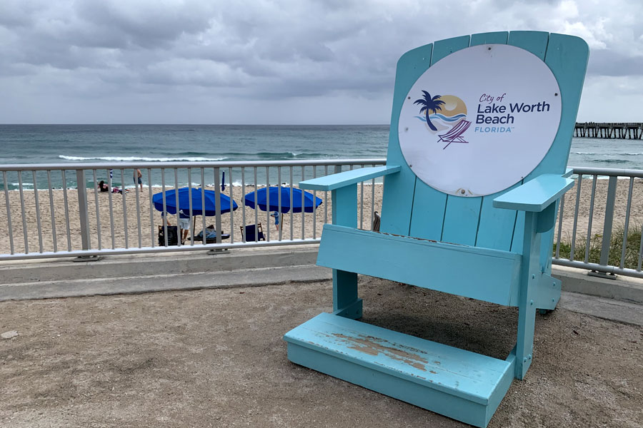 I love this chair that was built and placed on the boardwalk at our Lake Worth beach and this tourist loved it too!