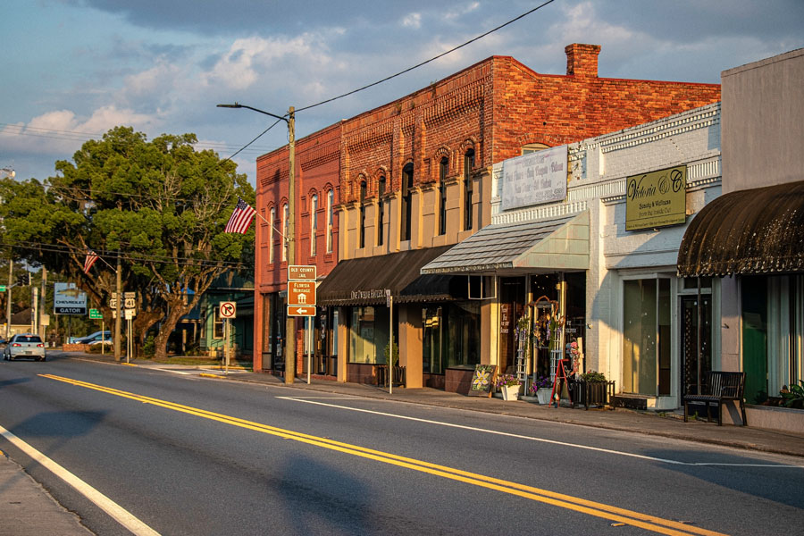 A few shops struggle to stay open between empty buildings in a once-booming downtown business district along U.S. Route 41.