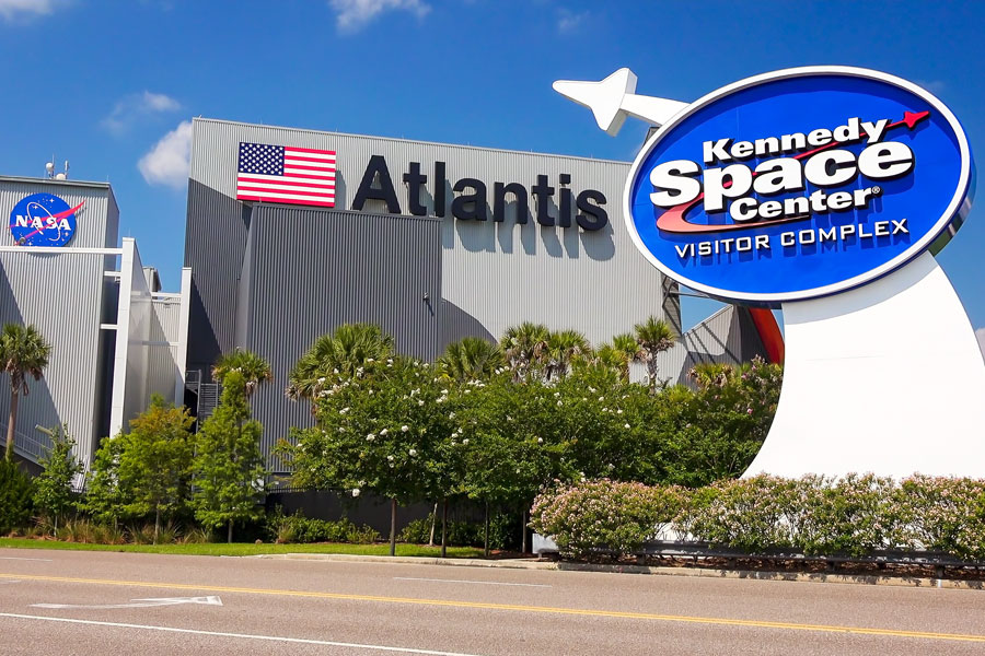 Entrance sign to the Kennedy Space Center Visitor Complex in Cape Canaveral, Florida on June 14th, 2016. Cape Canaveral, Florida, Editorial credit: CrackerClips Stock Media / Shutterstock.com, licensed.