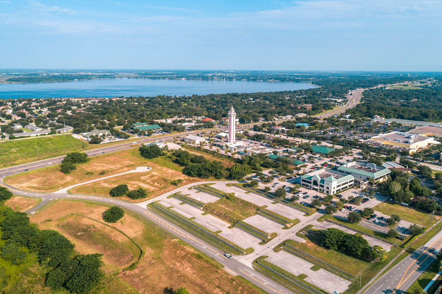 A serene day in the peaceful city of Clermont. A birds eye view of the historic Citrus Tower with Lake Minneola of the Chain of Lakes in the background. Just south of Minneola. Lake County, August 27th 2018. Photo credit: Noah Densmore, Shutterstock.com, licensed.