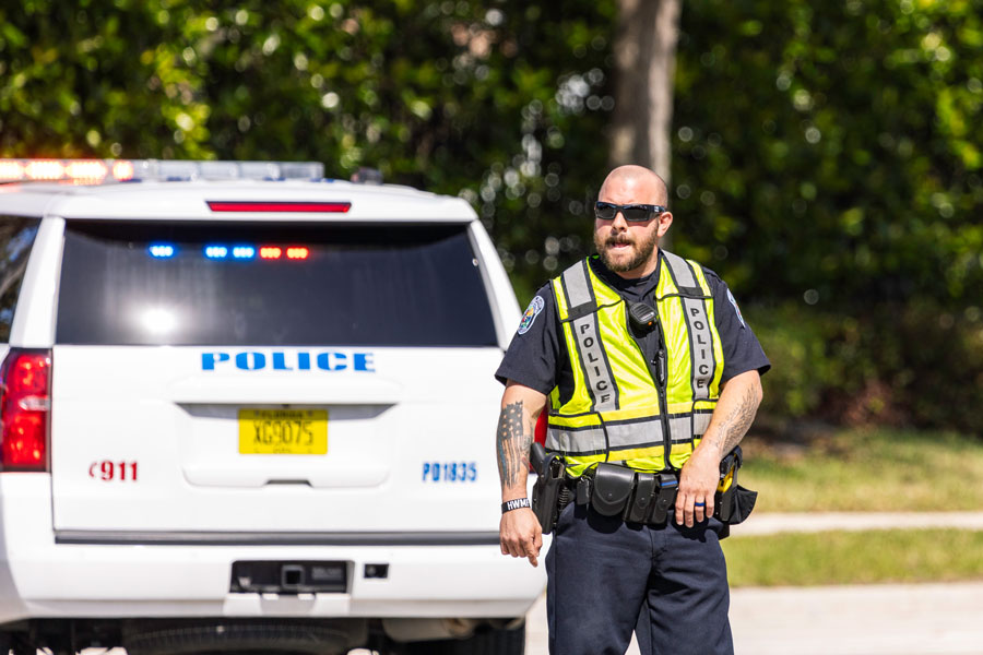 Police on the scene of an accident on Congress Avenue in Riviera Beach, Florida. February 20, 2021.