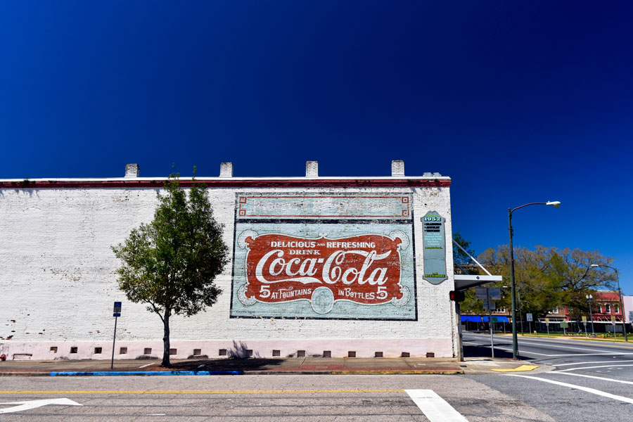 A mural in this quaint town on Florida's panhandle commemorates its Coca Cola millionaires, descendants of 67 early purchasers of stock on the beverage giant. Quincy, Florida,