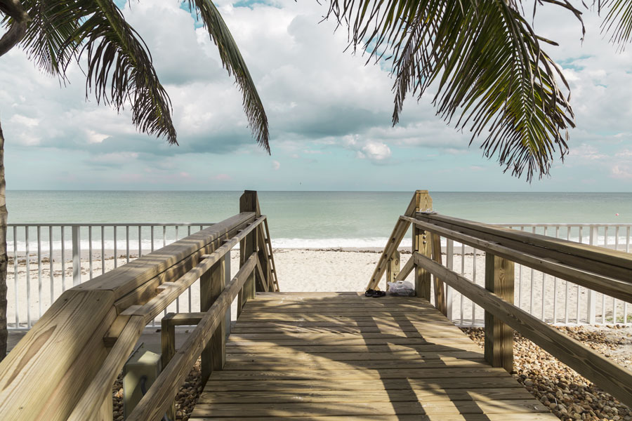 Wooden stairs on deserted beach dunes in Vero Beach, Florida. Photo credit ShutterStock.com, licensed.