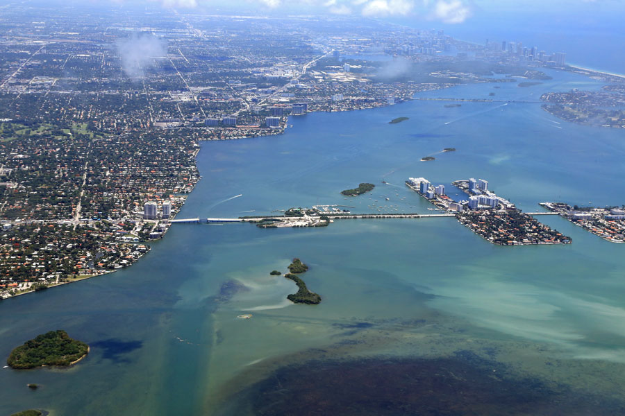 Aerial view of Venetian Causeway and Miami, with Biscayne Bay, and shallow waters. North Bay Village seen to the right. File photo: ShutterStock.com, licensed.