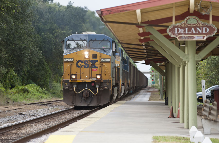  A CSX freight train hauling boxcars passing DeLand station in DeLand Florida in November 2013