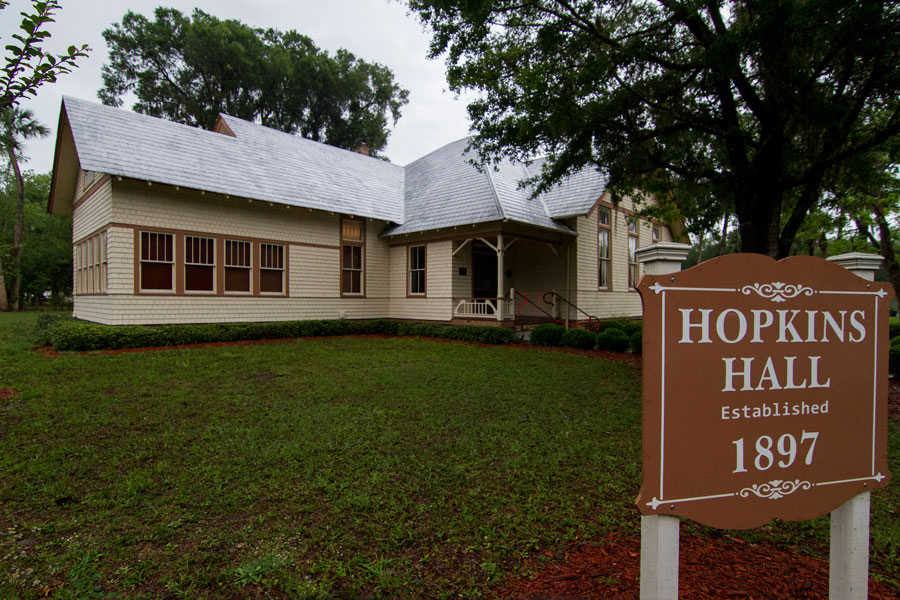 Hopkins Hall was built in 1897 for use as a community center and library. The library later moved to another location. It is listed on the National Register of Historic Places and is part of the Lake Helen Historic District.