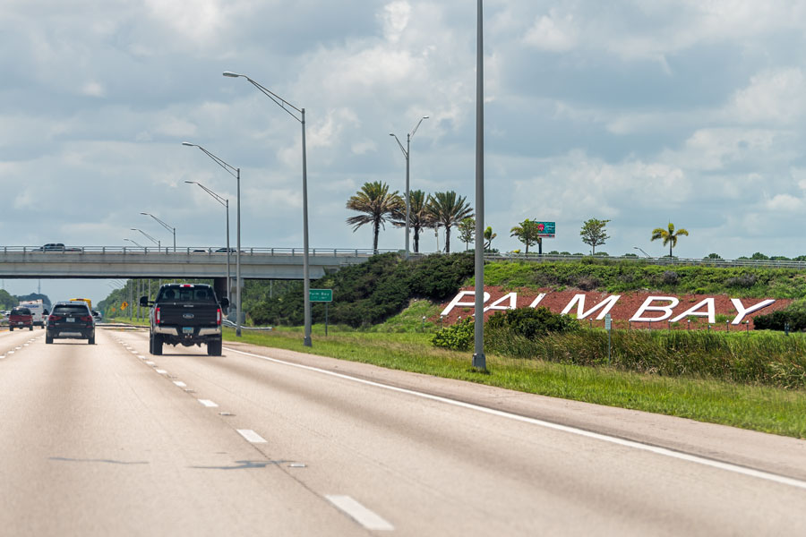 Interstate 95 in Brevard county, Florida where a sign welcomes drivers entering the city limits of Palm Bay.