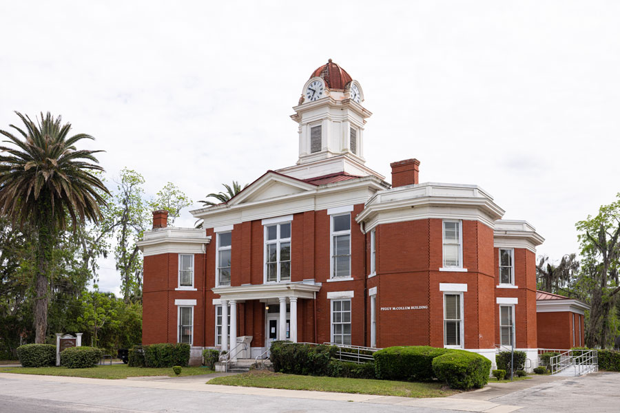 The old Baker County Courthouse, now known as the Emily Taber Public Library, is a historic landmark located in Macclenny, Florida. 