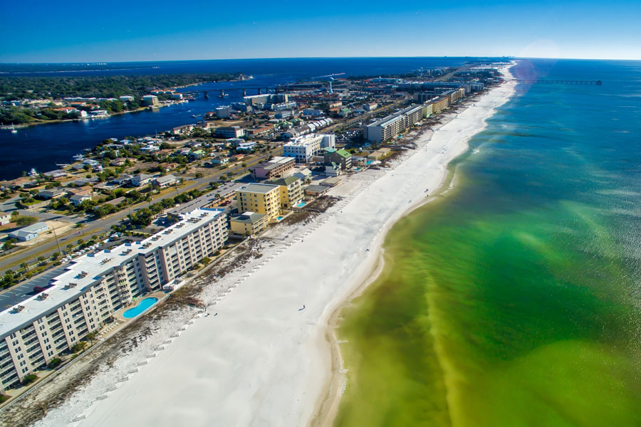 Fort Walton Beach, Florida is a coastal city known for its beautiful white-sand beaches and clear emerald-green waters. The city offers a variety of outdoor activities, including swimming, snorkeling, diving, fishing, and boating. Visitors can also explore the nearby Eglin Air Force Base and the Air Force Armament Museum, which features a collection of military aircraft and artifacts.