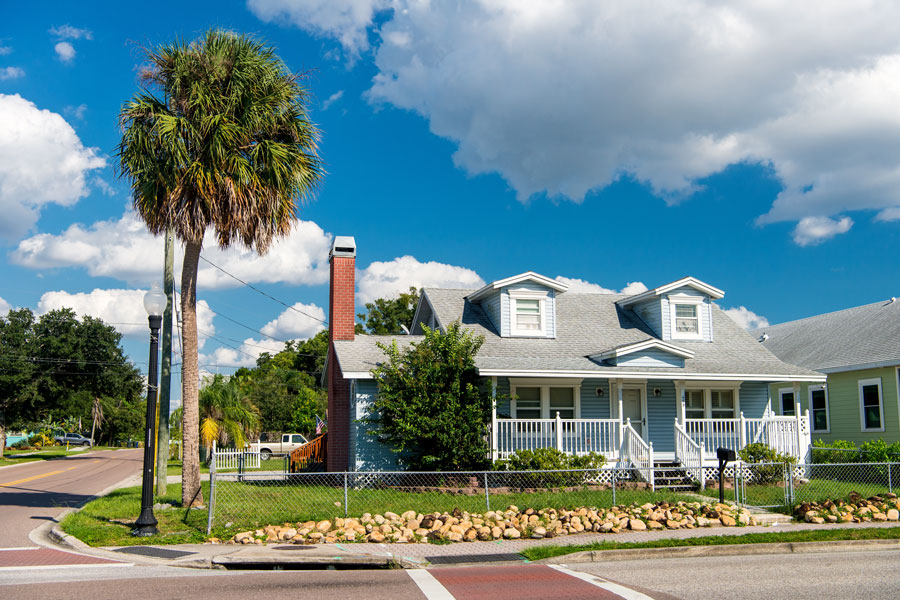 A cozy American style house with palm trees out front. Dunedin, Florida,