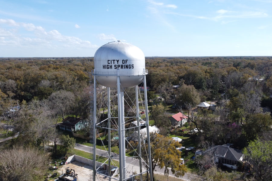 The water tower in High Springs, Florida, is a recognizable landmark in the city. It serves its primary function of providing water storage and pressure for the local water system.